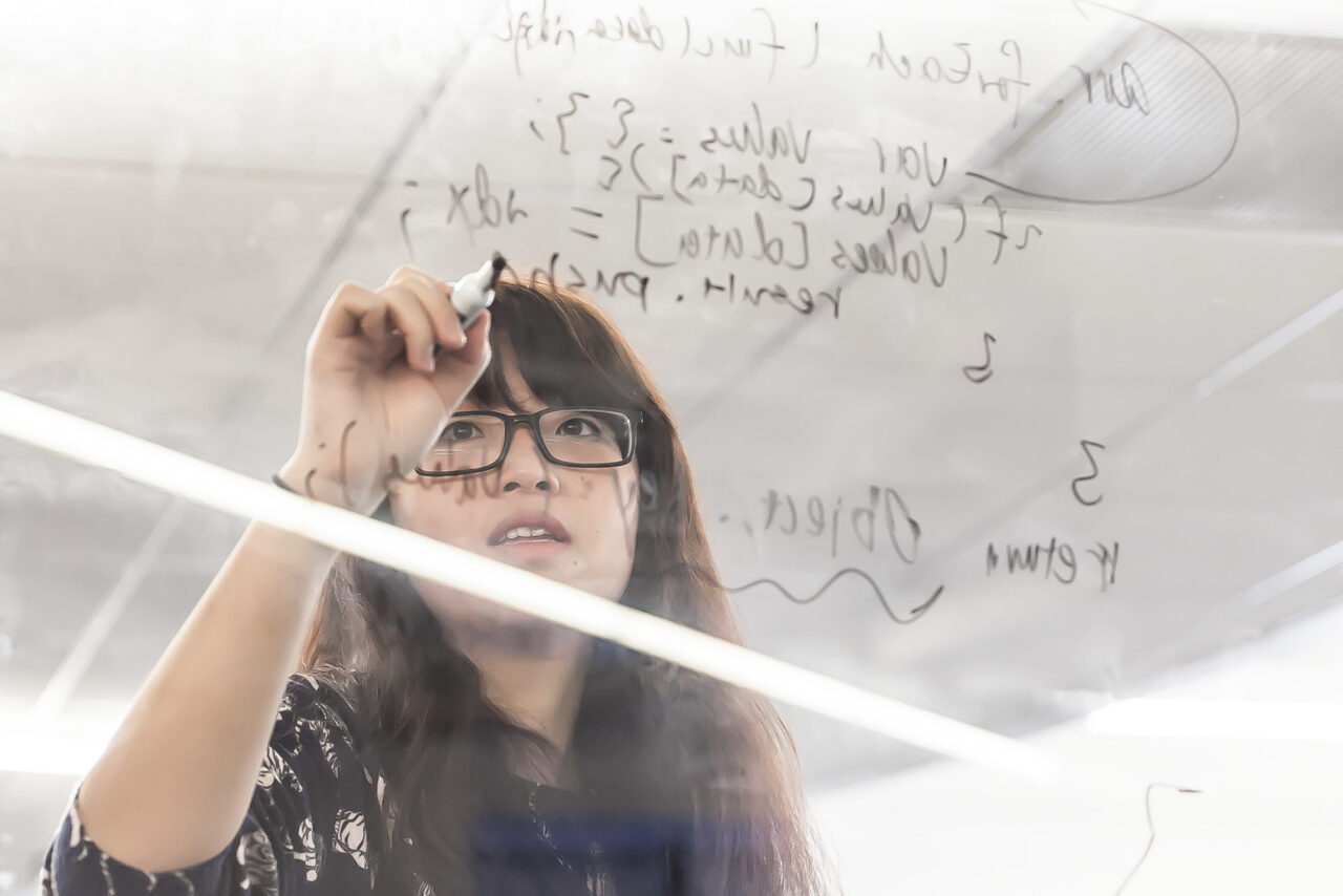Girl solving coding problem