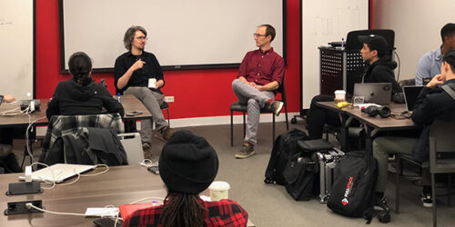 Collin Miller teaching class at Fullstack Academy